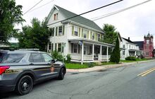 Press Enterprise/Bill Hughes The second-floor apartment of this house at the corner of Main and Church streets in Benton was the scene of a domestic shooting early Tuesday morning. A man was taken to the hospital and a woman was taken into custody.