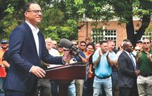 Pennsylvania Gov. Josh Shapiro addresses a gathering at the Jackson Mansion in Berwick on Monday morning regarding a multimillion investment by Amazon into data centers in Berwick and Bucks County. Behind him are dozens of union construction workers. 