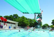 Graham Marshall, 10, Bloomsburg, makes use of the diving board at the Bloomsburg town pool Tuesday.