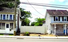 This lot, now behind a fence at 712 Poplar Street in Bloomsburg, has been discussed by Town Council as an example of the problems with current zoning laws. There was a fire in the house that used to be on the lot. The remains were later demolished and the lot was cleared and fenced in. 