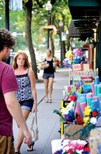 Goods are displayed outside of the shops along Main Street in downtown Bloomsburg during Sidewalk Sales Days on Thursday. The sales continue today and Saturday. 