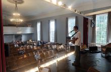 Van Wagner preforms on the stage at the DeLong Memorial Hall in Washingtonville Tuesday evening for the last of the summer evening concert series.