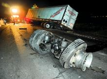 A set of wheels came to rest in the middle of the westbound lanes of Interstate 80 near Mifflinville Monday night after this tractor-trailer struck guardrails on I-80 before the Route 239 overpass and took out about another 100 feet of rail after the bridge. The driver was not hurt in the accident.
