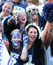 Fans cheer from the Berwick student section during Friday's season opener at home against Crestwood.