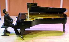 Bloomsburg pianist Richard Qian plays Alexander Scriabin’s Sonata No. 2 in G-Sharp Minor during the final round of the Scottish International Youth Piano Competition.