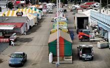 Concessionaires set up their stands near the grandstand in preparation, on Monday, for the 158th Bloomsburg Fair. This year the fair will begin charging admission at 2 p.m. on Friday, Sept. 20. The fair runs through Saturday, Sept. 28.