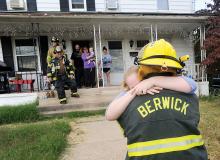 Amanda Deschaine, 24, hugs Kevin Schaffer, 21 after accepting his proposal of marriage in front of their home on Susquehanna Avenue in Berwick Sunday afternoon.