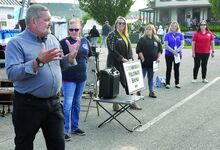 Nicholas “Chip” Gilliland, Chief of Outreach Programs for Pennsylvania's Department of Military and Veterans Affairs, left, spoke about programs available Wednesday at the Bloomsburg Fair