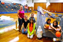 Members of the Berwick YMCA Team Leader's program, from left, Kathleen Kurtz, Autumn Kinney, Justin Philbert, Elizabeth Diltz, Damaris Ayala and Krista Talanca, pose after setting up for the Berwick YMCA Haunted Trail at the YMCA Sunday afternoon. The Haunted Trail, set up throughout the Berwick YMCA is open to the public and runs from 6 p.m. until 8 p.m. tonight.