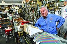 Press Enterprise/Jimmy May Bill Morris stands behind the counter of Bill’s Custom Cycles in South Centre Township Wednesday afternoon. After 53 years Morris is looking to sell the business. 