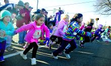 Girls take off at the start of the 1/4 mile Market Street Children's Races Saturday morning in Berwick. The kids races are run just days before the Run for the Diamonds.