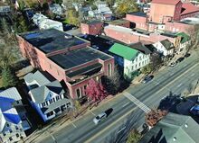 The former Moose Exchange building along West Main Street has been largely untouched since a fire ripped through it in January 2014, and the town codes office is now pushing the nonprofit that owns it to make sure it doesn’t become an eyesore.