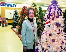 Berwick Kmart Assistant Manager Holly Waltman stands in the store's Christmas department