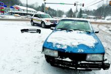 This Chevrolet Cavalier was involved in a collision at the snow-covered intersection of Route 487 and Fowlersville Road Saturday afternoon. One passenger was taken to the hospital. 
