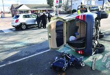 Press Enterprise/Jimmy May No one was injured in a two vehicle crash on Market Street in Bloomsburg Monday which left one vehicle on it’s side. 