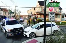 A Bloomsburg Police Officer used his pickup truck to stop the driver of a stolen car at the intersection of Popular and East Eighth streets Friday afternoon during a pursuit. 