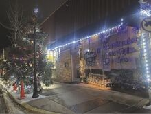 A community christmas tree shines outside Amigos Pizzeria & Mexican Restaurant Saturday night. The Danville restaurant was closed after agents for Immigration and Customs Enforcement arrested owner Sergio Chavez Jimenez that morning.