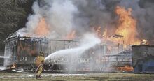 Flames consume a trailer home at 557 Winding Road in Fishing Creek Township on Wednesday afternoon.