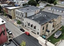 Danville council members are looking at a $300,000 bill to repair two roofs, including the one on the Danville Municipal Building along Mill Street, at right.