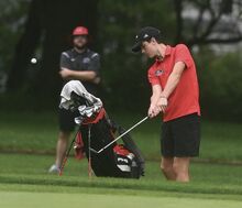 Bloomsburg’s Ryan Scherer chips his ball onto the green on hole No. 4 in a match against Central Columbia at Frosty Valley Golf Club in Danville.