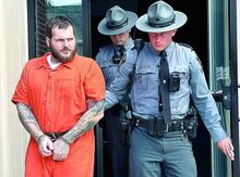 Vincent Harp is led out of the Columbia County Courthouse by Trooper Andew Dalkiewicz Monday afternoon following a preliminary hearing.  Harp was charged last month with killing his wife Katyln Harp and dumping her body. 
