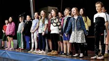 Nescopeck Elementary School fourth graders sing a version of “Take Me Home, Country Roads” by replacing original place names with Pennsylvania place names and landmarks such as the Susquehanna River during a spring music program for parents and fellow students on Wednesday