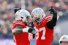 Ohio State linebacker Arvell Reese, left, celebrates his sack against Penn State with teammate defensive lineman Kenyatta Jackson during the second half of an NCAA college football game, Saturday, Nov. 1, 2025, in Columbus, Ohio. (AP Photo/Jay LaPrete)