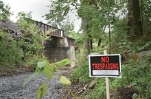 No Trespassing signs have been put up on the water’s edge near the Rupert Bridge in Bloomsburg in preparation for construction on the railroad trestle.