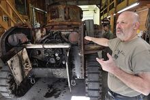 Steve Greenberg, Portland, Oregon, discusses the restoration of the 80-year-old M3A1 Stuart tank in Berwick. He restored his own M3A1 Stuart and is assisting with Lady Lois, Berwick's tank.